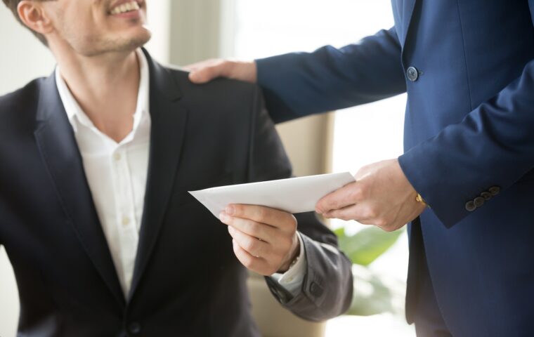 Company,Leader,Giving,Money,Bonus,In,Paper,Envelope,To,Happy